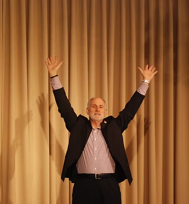 Dave Ray delivering a keynote address from stage